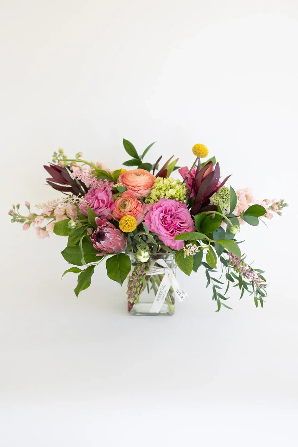 Bouquet of flowers in a clear vase same day delivery new york city.