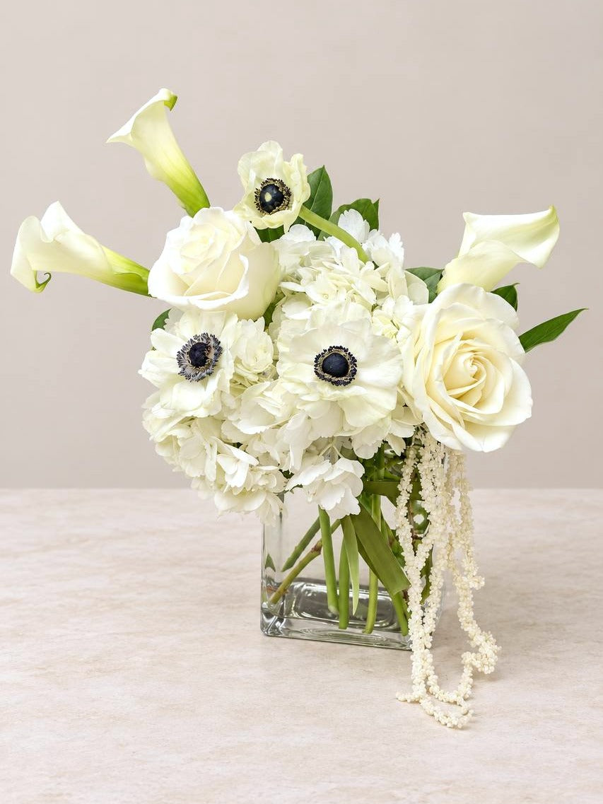 Calla Noir small: white calla lilies and anemones sized for a coffee table