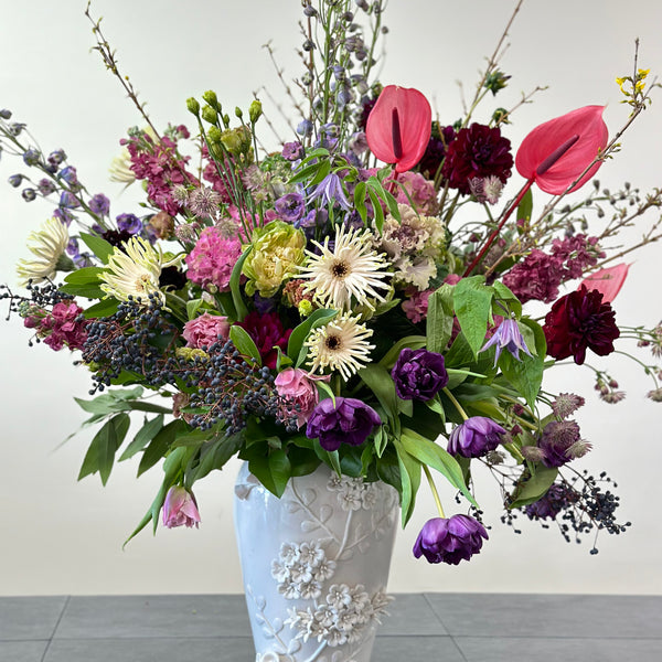 Bouquet with pastel pink and white flowers in a vase