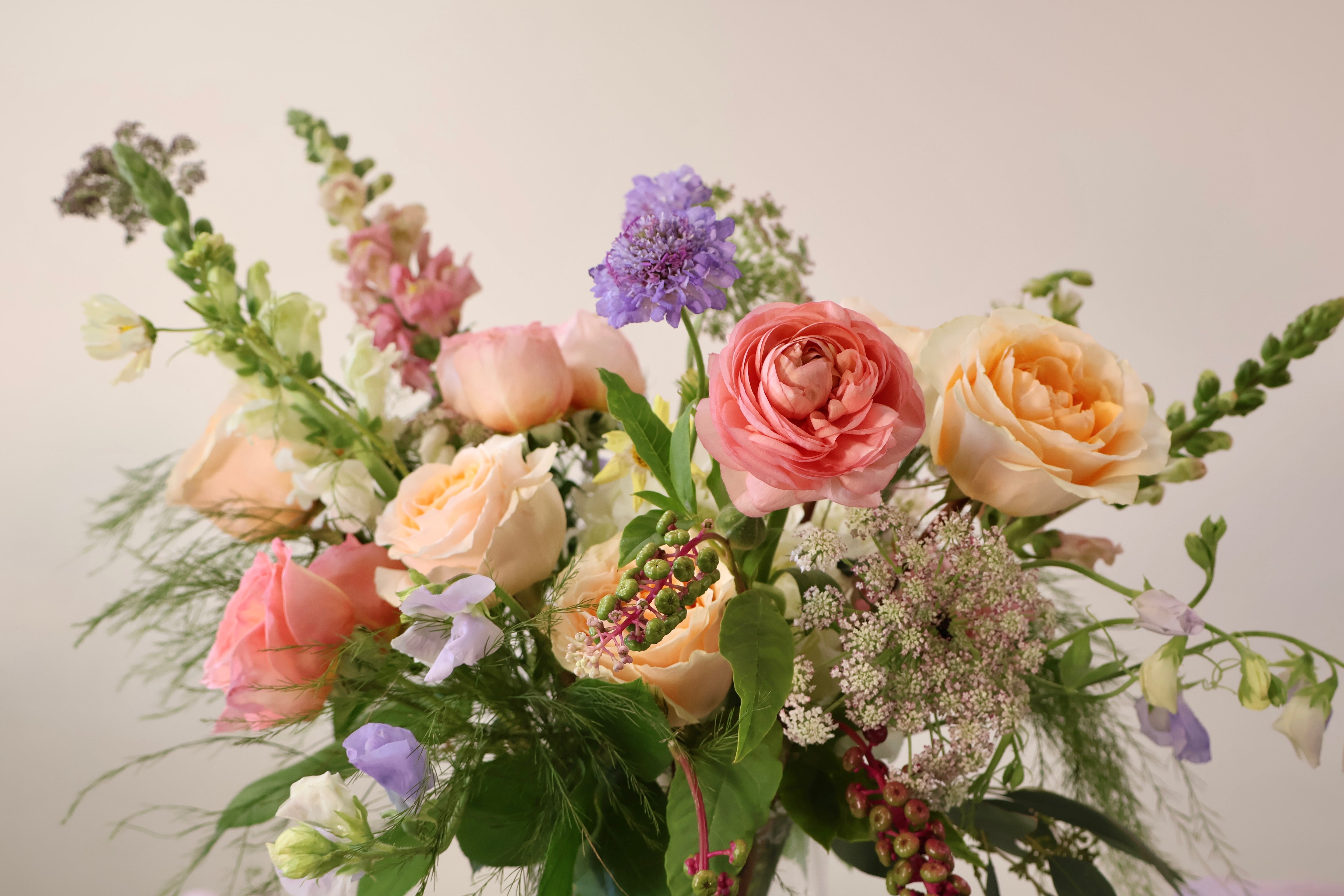 Bouquet of colorful flowers as arrangement. 