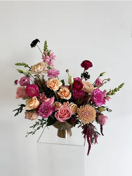 A bright bouquet with colorful flowers in a vase.