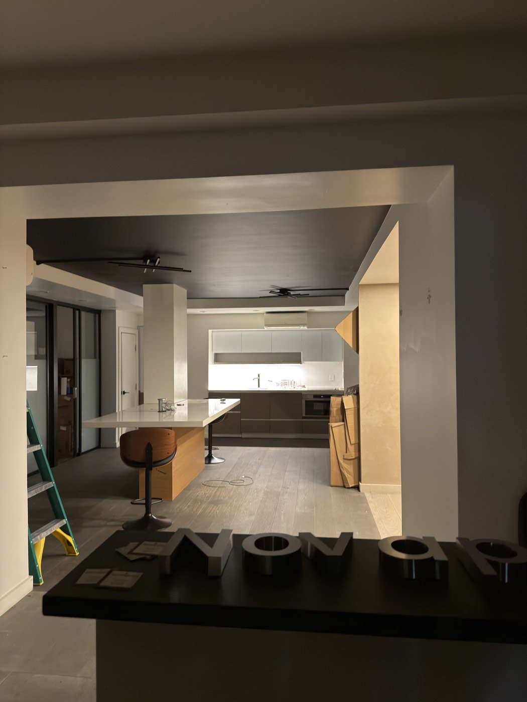 The Upper East Side studio before opening, with the Novapetal letters lying on the counter and a ladder still in the room